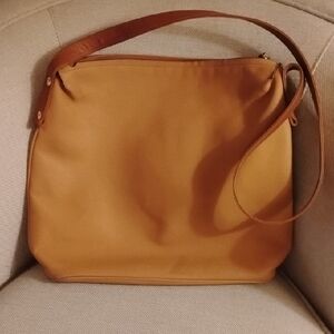 Franklin Covey mustard yellow shoulder bag with tan strap